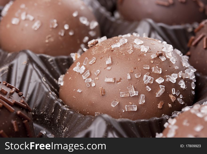 Truffle candy coated chocolate with decorative powdered for the occasion.