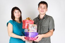 Happy Man And Girl Holding Many Gifts Royalty Free Stock Photography Happy Man And Girl Holding Many Gifts Royalty Free Stock Photography
