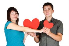 Girl And Man Holding Two Paper Hearts, Smiling Royalty Free Stock Photography Girl And Man Holding Two Paper Hearts, Smiling Royalty Free Stock Photography