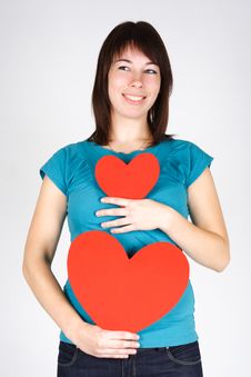 Beauty Girl Holding Two Paper Hearts, Smiling Stock Photography
