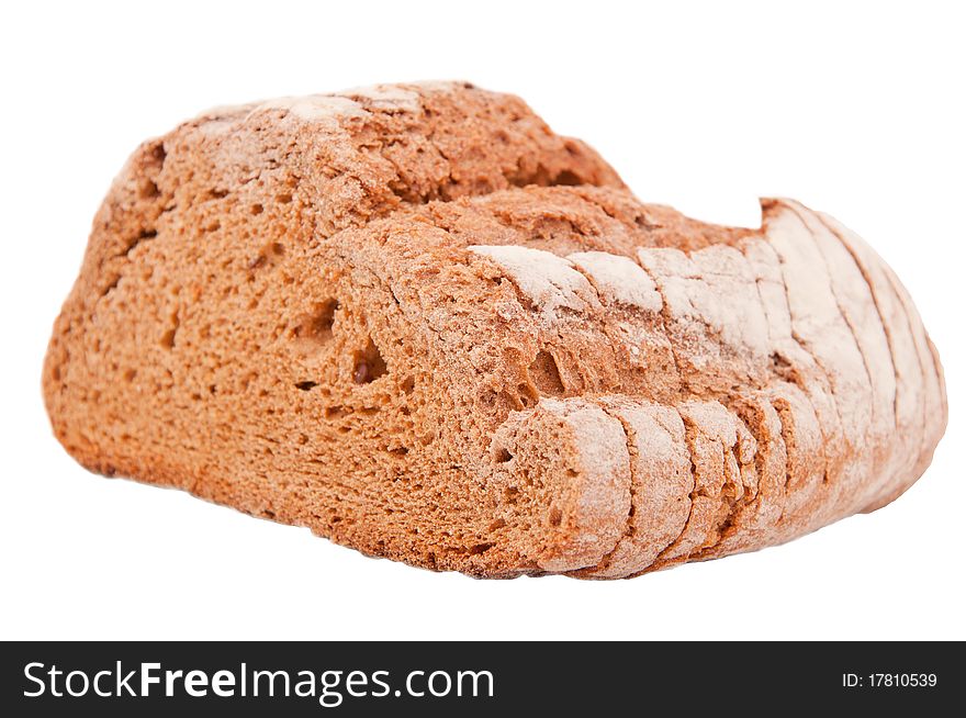 A loaf of pumpernickel bread made with natural ingredients on a white background. A loaf of pumpernickel bread made with natural ingredients on a white background.