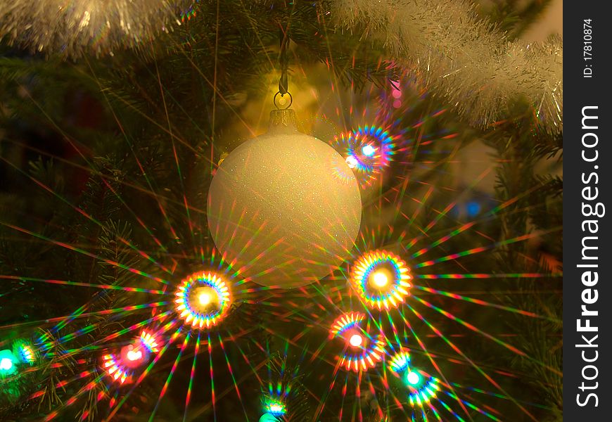 Christmas tree decoration with colorful beams of lights