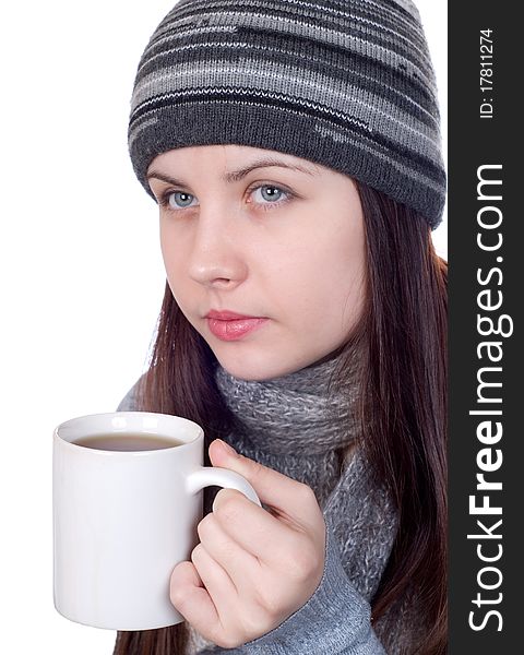 The girl with a tea mug on white a background