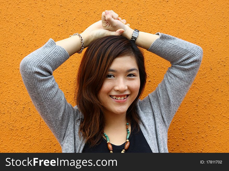 An asian girl who is smiling