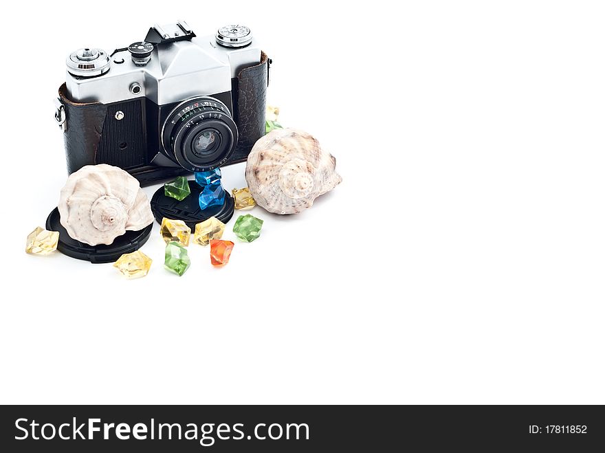 Black retro analog camera with lens. Isolated on white