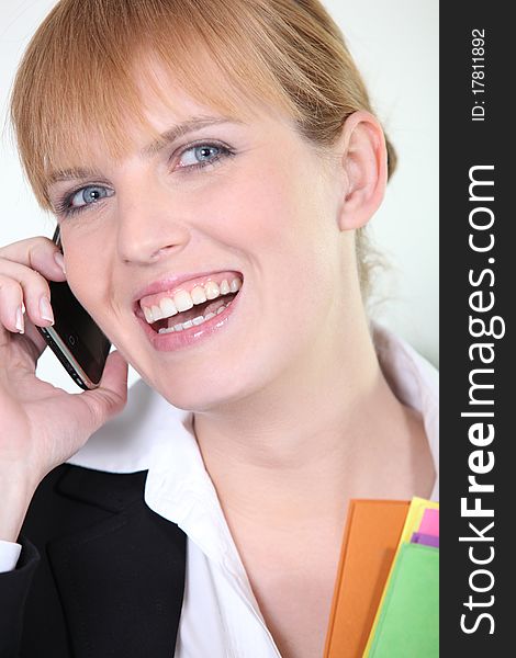 Young Businesswoman Smiling On Phone