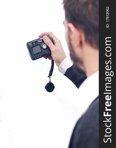 Man holding camera in his hands isolated on white. Man holding camera in his hands isolated on white