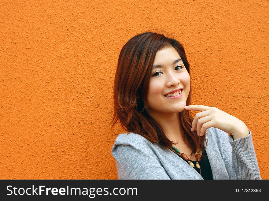 An asian girl who is smiling