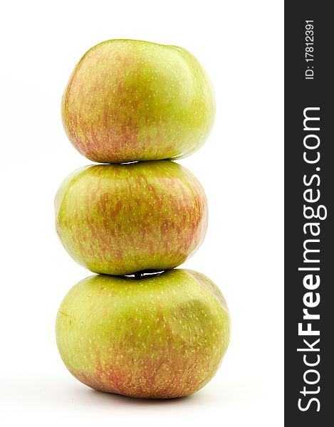 Stack of three apples over white background. Stack of three apples over white background