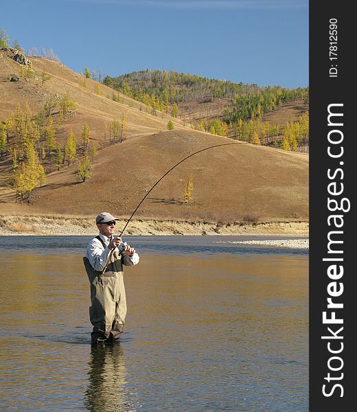 Fishing - one fisherman on river