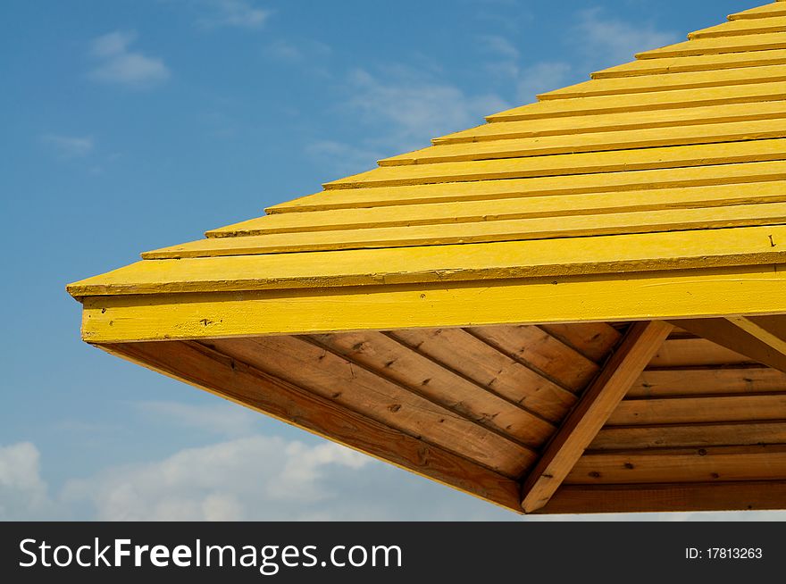 Wooden roof on blue sky. Wooden roof on blue sky