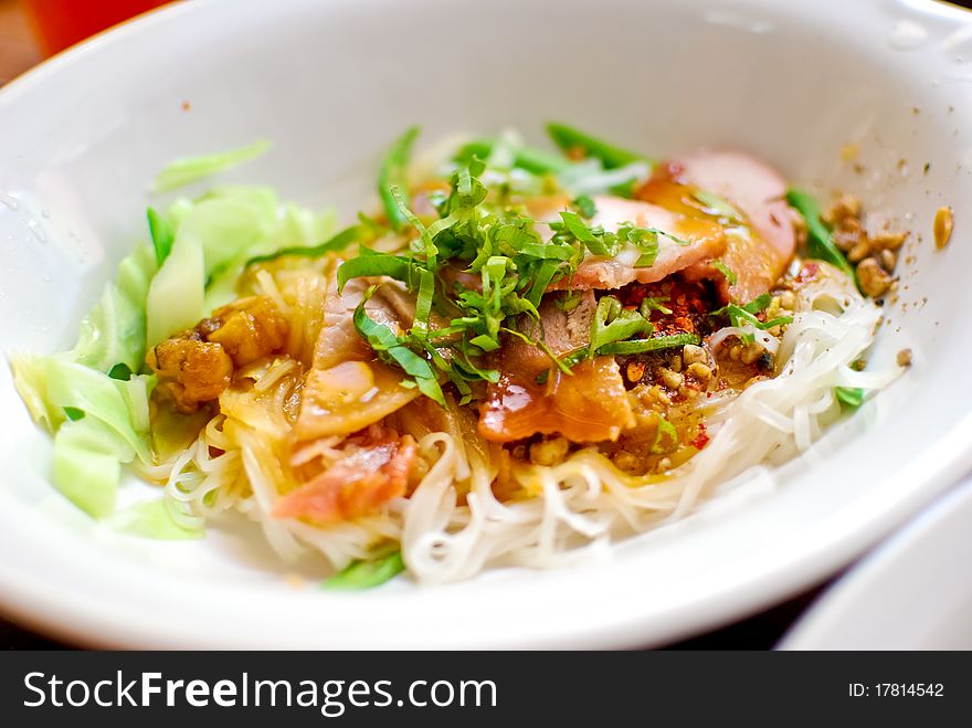 Asian style noodle with pork and vegetables