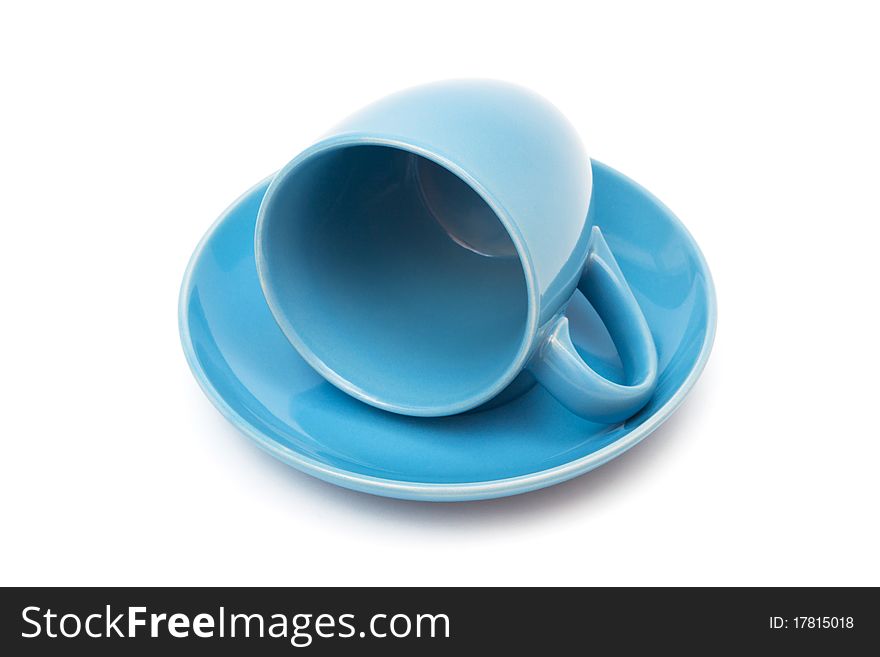 Blue coffee cup and saucer on a white background