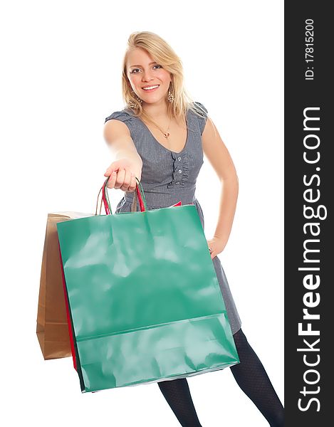 Lovely blond with shopping bags over white
