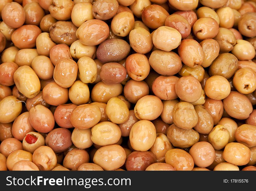 Background of ripe marinated olives at the market. Background of ripe marinated olives at the market