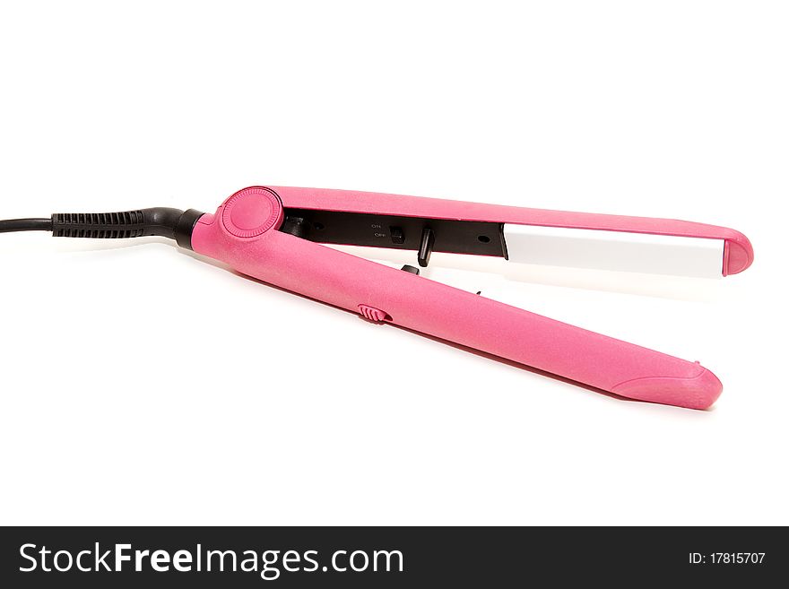 Electric pink hair straightener on a white background