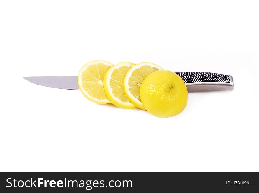 Lemon knifed on a white background. Lemon knifed on a white background