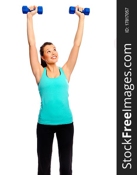 Young attractive woman trains and tones with weights, isolated on white. Young attractive woman trains and tones with weights, isolated on white