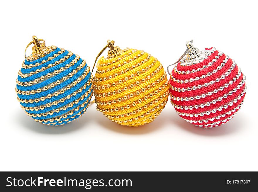 Three Christmas decorations on a white background