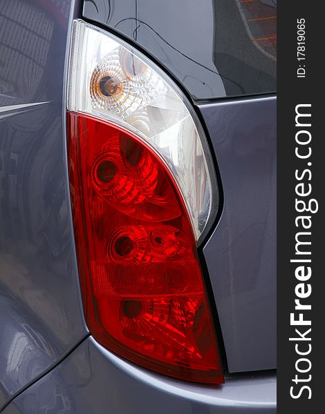 The close-up of taillight of car. The close-up of taillight of car