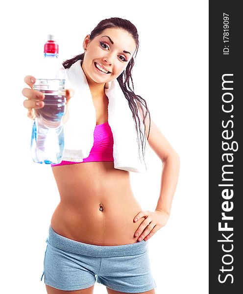 Beautiful young sporty woman drinking mineral water. Beautiful young sporty woman drinking mineral water