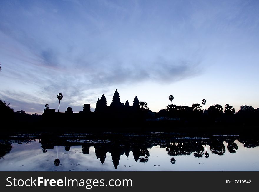 A sunrise at the reflecting pond of Angkor Wat, Cambodia. A sunrise at the reflecting pond of Angkor Wat, Cambodia