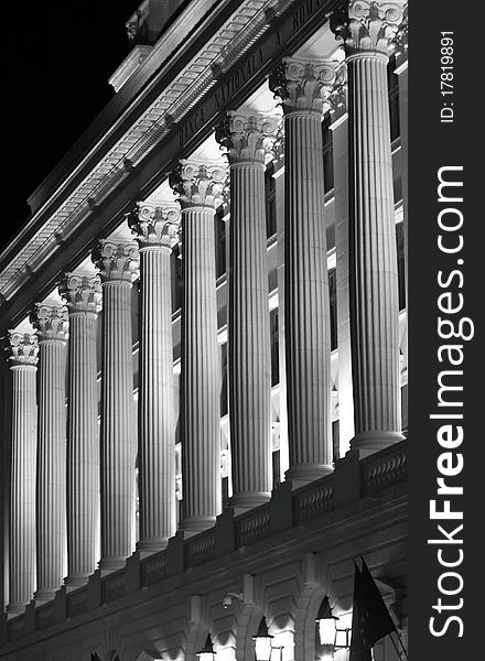 Historical building facade, at night, with classical columns. Historical building facade, at night, with classical columns