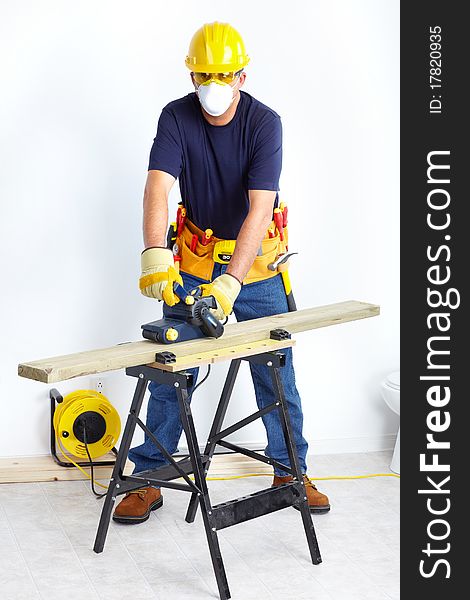 Mature contractor working. Over white background