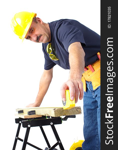 Mature contractor working. Over white background. Mature contractor working. Over white background
