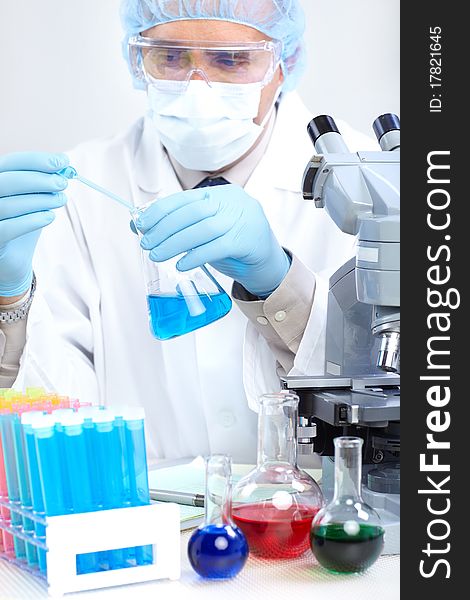 A scientist man working in laboratory