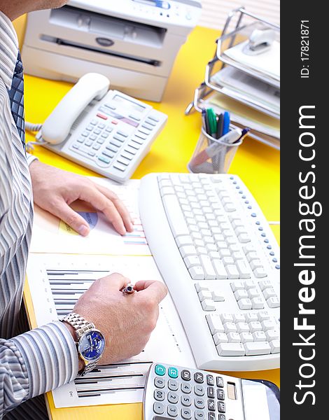 Businessman working with documents in the office