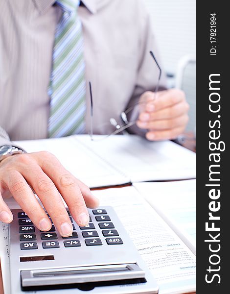 Businessman working with documents in the office