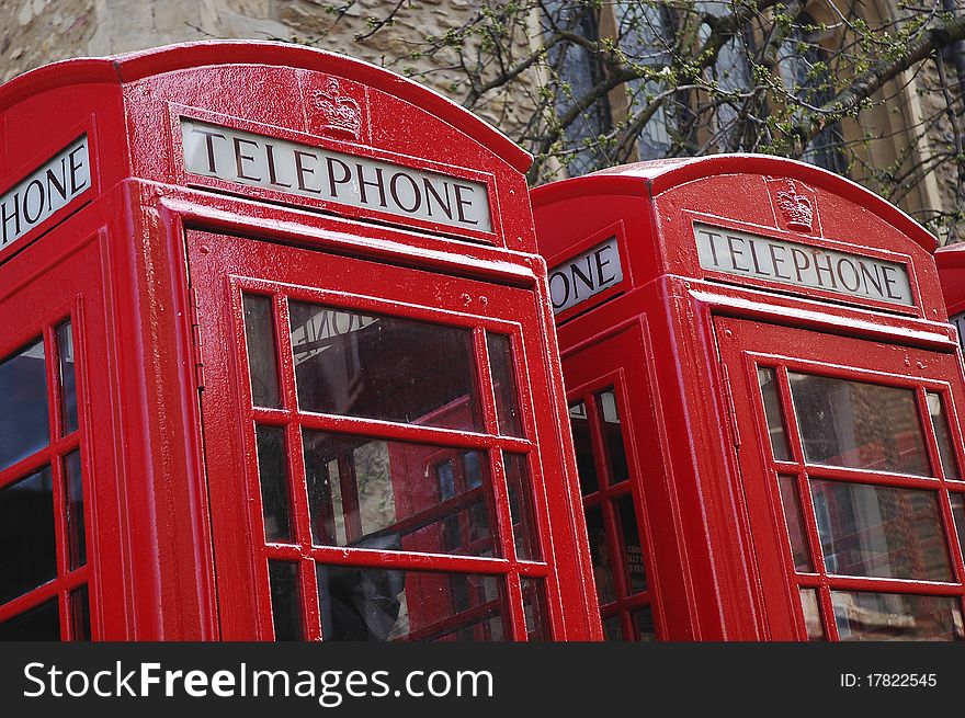 Two traditional red phone boxes