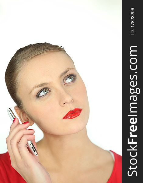 Young woman on phone with red lipstick. Young woman on phone with red lipstick