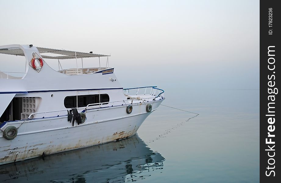 The moored yacht in the sea