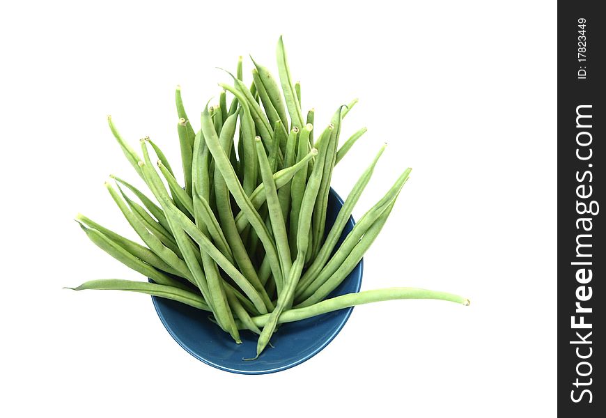 Green beans in a bowl on white background
