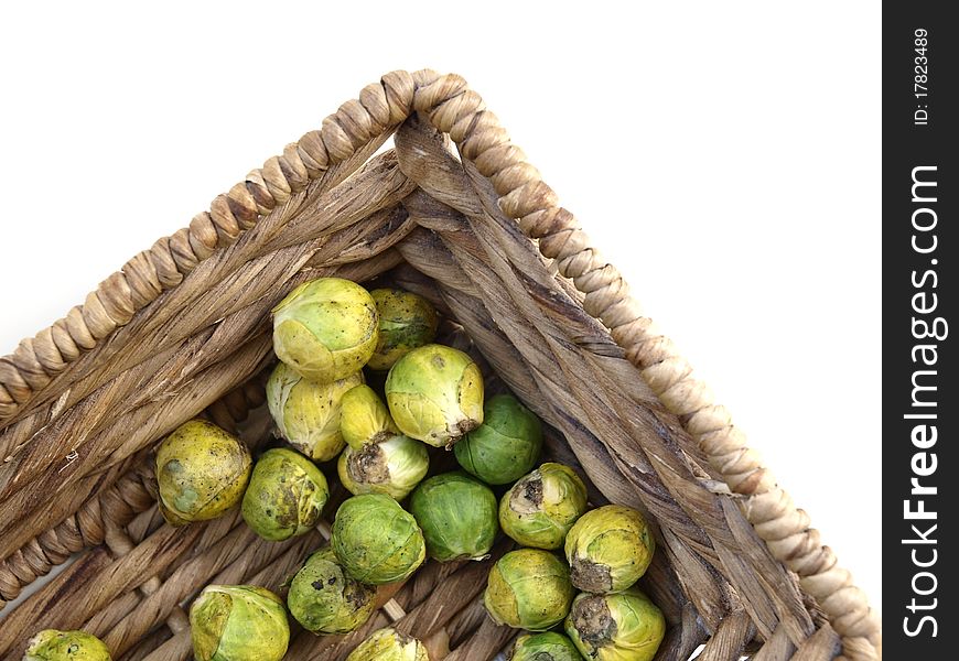 Raw and fresh brussels sprout in a basket