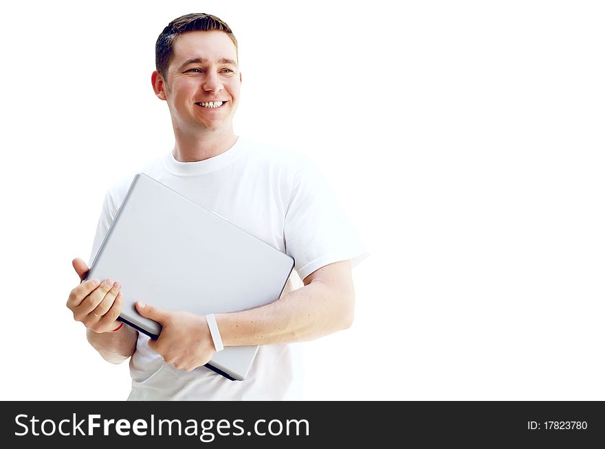Young happy man or student with laptop and phone on the white background