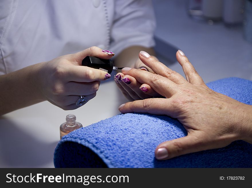 Nail manicure at beauty salon. Nail manicure at beauty salon