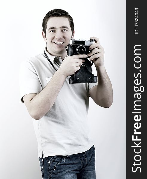 Happiness man with vintage photo camera. Happiness man with vintage photo camera.