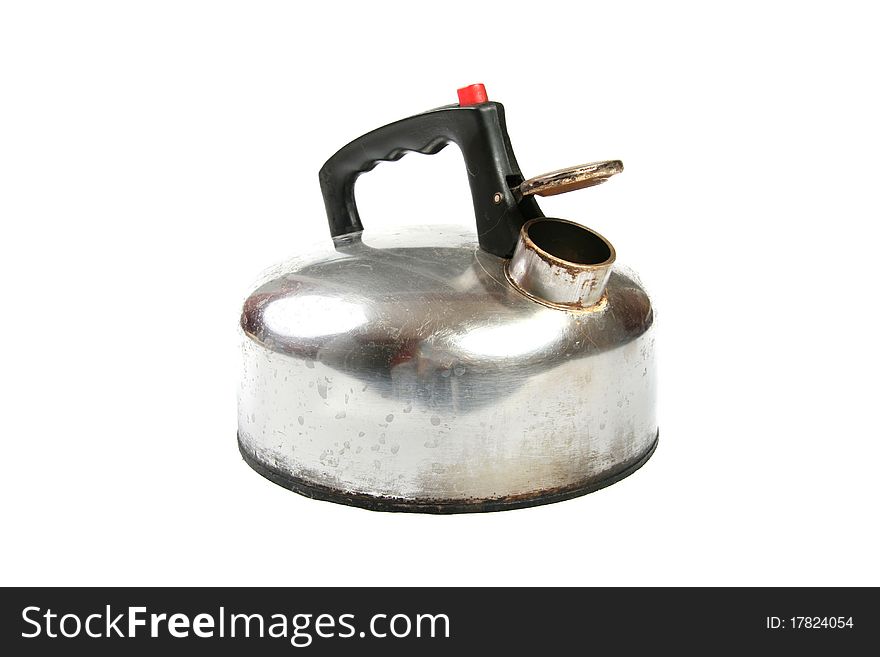 Old metal teapot isolated on white background