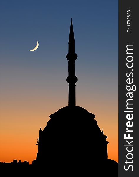 Small modern Turkish mosque outlined by twilight showing dome and minaret. Small modern Turkish mosque outlined by twilight showing dome and minaret.