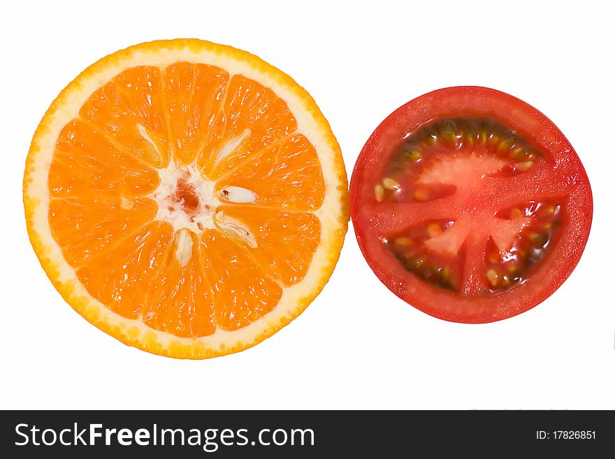 Orange and tomato on white background
