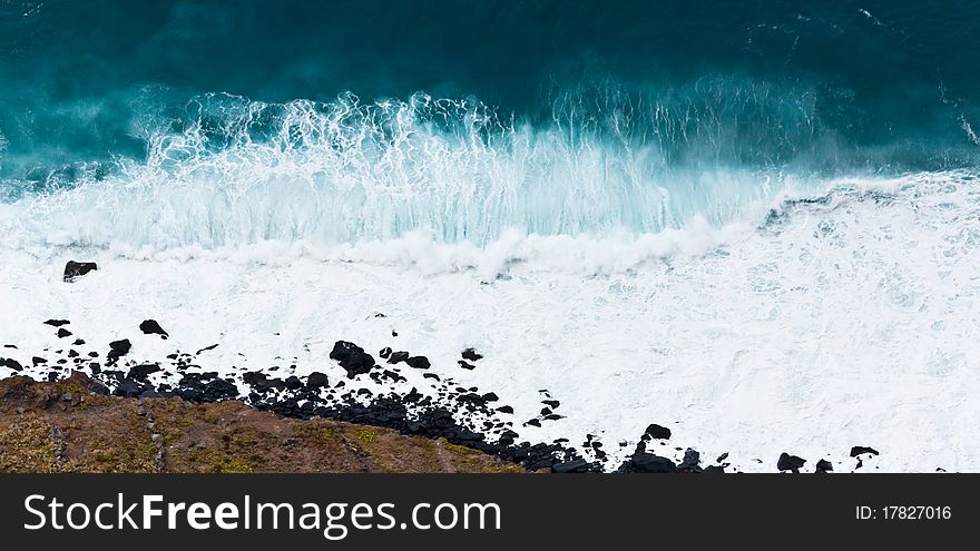 Big ocean wave, surfer, storm