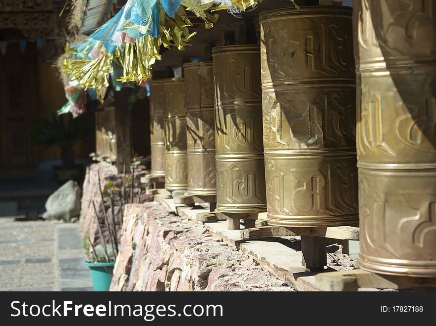 Tibetan prayer wheel in a Lamasery in Li Jiang city, Yun Nan China.