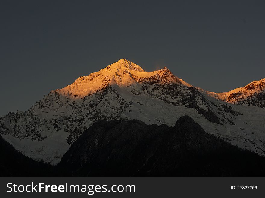 Sunshine in the golden snow mountain