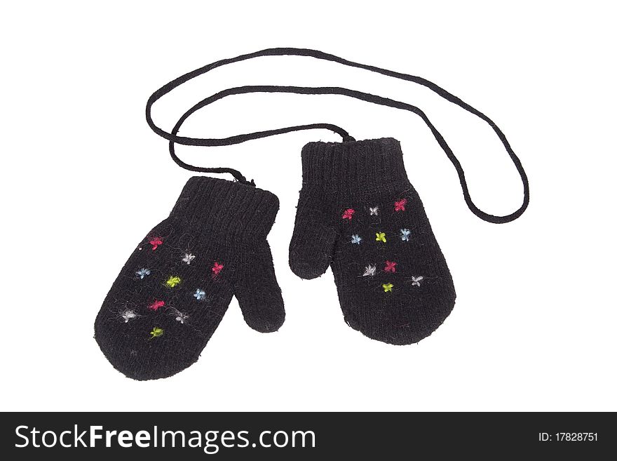 Black wool knit baby mittens on a string. Black wool knit baby mittens on a string