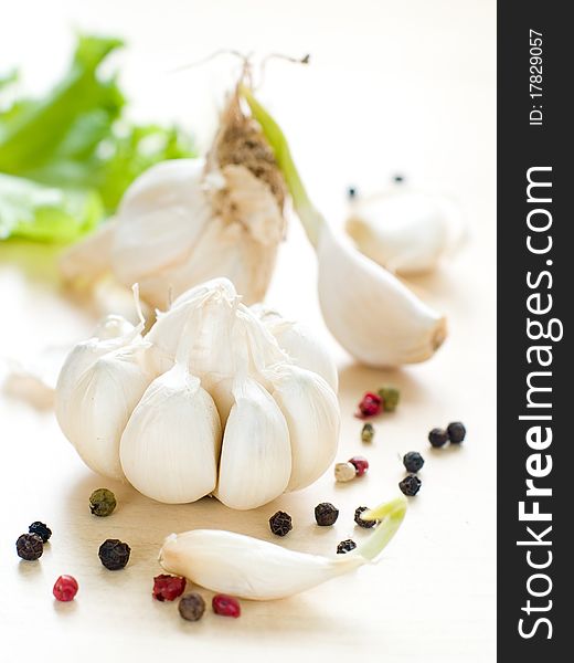Fresh garlic on kitchen table