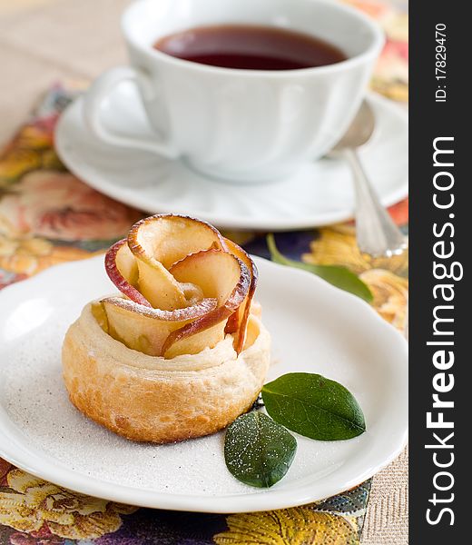 Apple cake with cup of tea like flower. Apple cake with cup of tea like flower