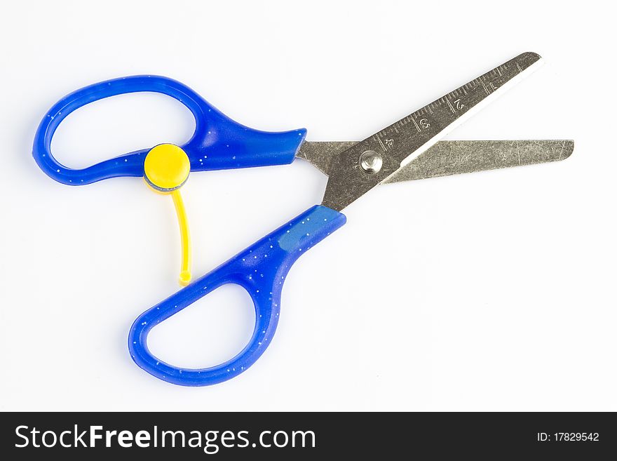 Pair of small blue cheap plastic measuring school scissors. Pair of small blue cheap plastic measuring school scissors